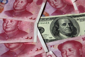 Власти Китая изучат возможность девальвации юаня